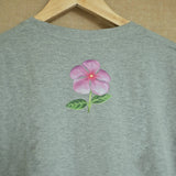 Periwinkle blooms through the hurt 🌼