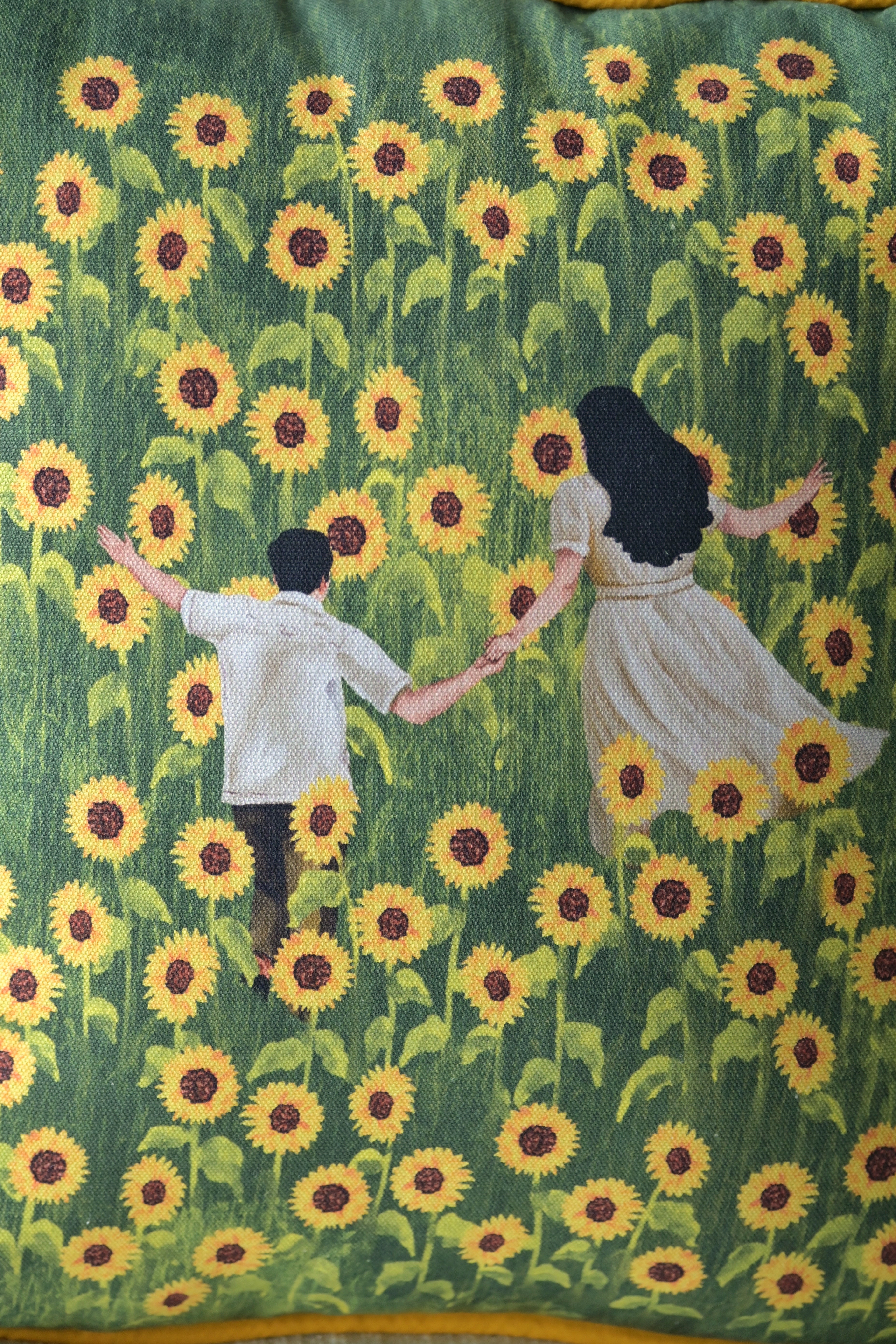 Running together in a Sunflower field