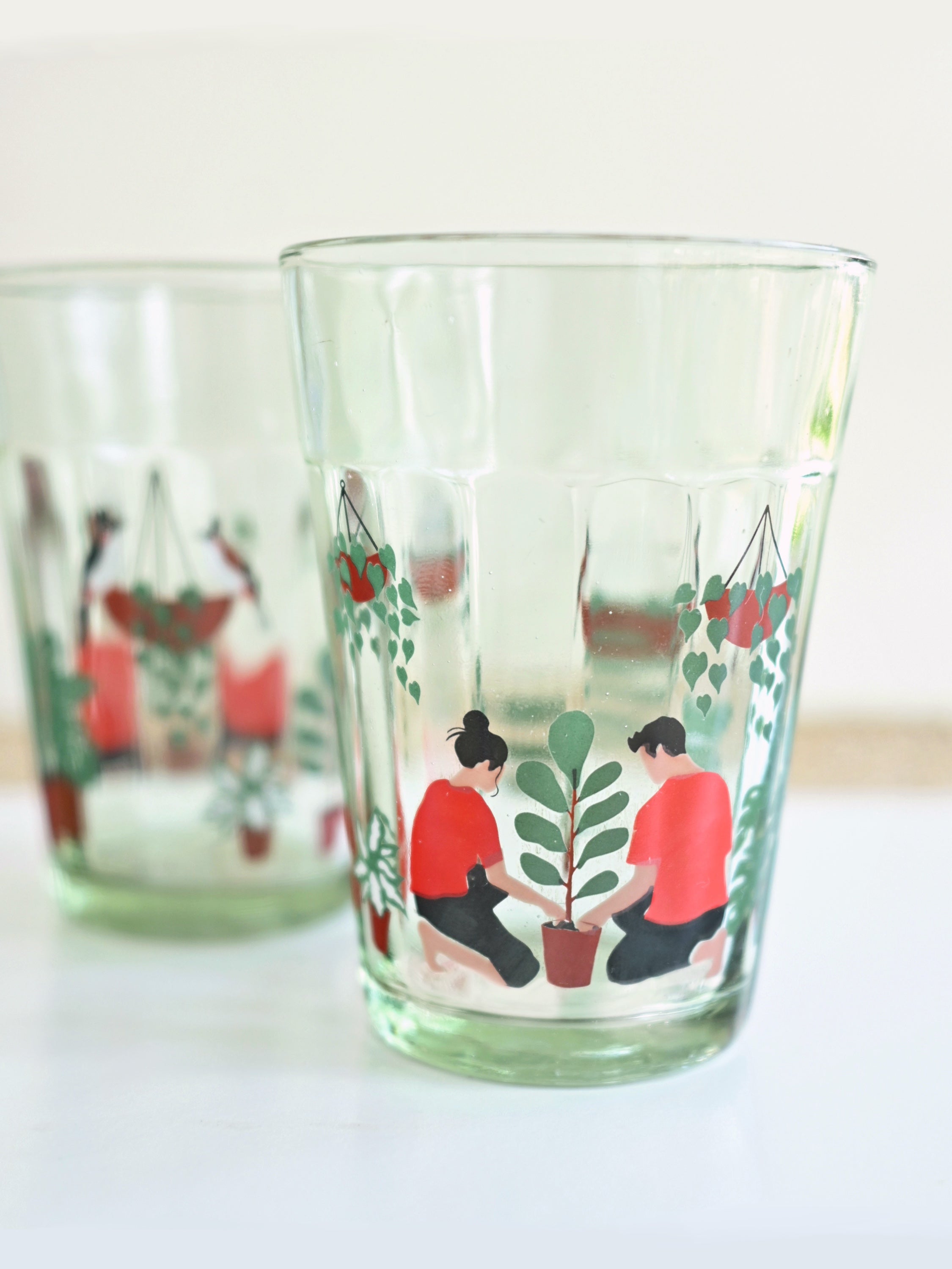 Chirping Bulbuls in the balcony garden (set of two)